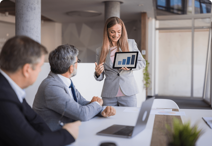 Businesswoman presenting statistics on tablet