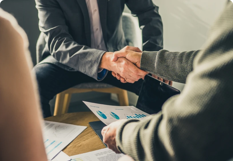 Handshake during business discussion